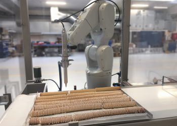 Dosierung von Zuckerguss auf Backwaren