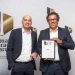Dirk Bolz, Director Global Marketing bei Hima (rechts), und Sebastian Callies, Geschäftsführer Callies & Schewe Kommunikation, freuen sich über den German Brand Award 2018. Bild: Hima