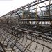 Bis zu zwölf Meter lang sind die Pfähle, die für das neue HERMA Haftmaterialwerk in den Boden eingelassen wurden. Im Bild zu sehen sind die Bewehrungskörbe der Pfähle.